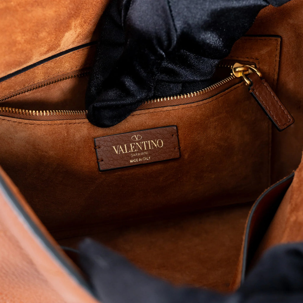 Brown Roman Rockstud Quilted Flap Bag
