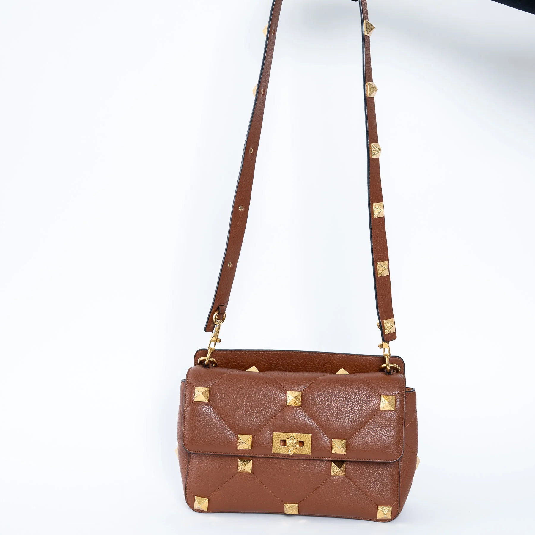 Brown Roman Rockstud Quilted Flap Bag